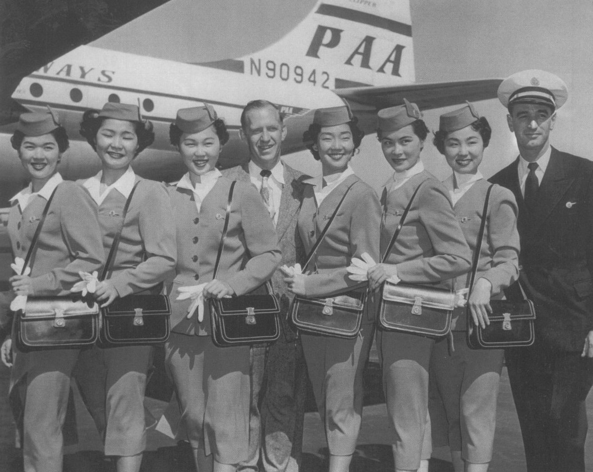 1950s Pan Am always looked to hire stewardesses with language skills.  Here a class of newly hired Japanese American woman pose by a Boeing  377 Stratocruiser.
